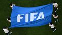 The FIFA flag is displayed on the pitch ahead of the start of the Qatar 2022 World Cup Group F football match between Belgium and Morocco at the Al-Thumama Stadium in Doha on November 27, 2022.  
Kirill KUDRYAVTSEV / AFP