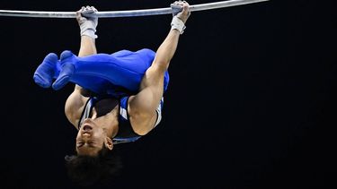 2022-11-06 19:11:25 Japan's Daiki Hashimoto competes during the Men's Horizontal Bar final at the World Gymnastics Championships in Liverpool, northern England on November 6, 2022. 
Ben Stansall / AFP