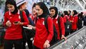 Members of Iran's women's football team walk as they arrive at the Kuala Lumpur International Airport after taking part in the AFC Women’s Asian Cup Australia 2026 tournament in Australia, in Sepang on March 11, 2026. At least five players from Iran's visiting women's football team claimed asylum in Australia on on March 10, seeking protection after they were branded 