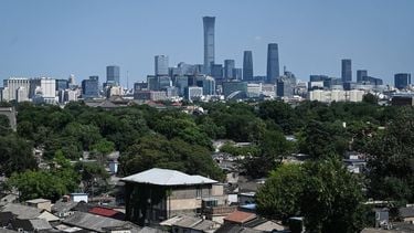 A general view shows the city's skyline and traditional Hutong alleyway houses in Beijing on June 5, 2026. 
Jade GAO / AFP