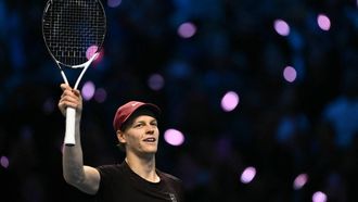 Italy's Jannik Sinner celebrates after winning his semifinal against Australia's Alex De Minaur at the ATP Finals tennis tournament in Turin on November 15, 2025. 
Marco BERTORELLO / AFP