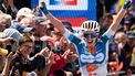French dsm-firmenich PostNL team's cyclist Juliette Labous celebrates while crossing the finish line to win the Elit road women French championships cycling race, in Saint-Martin-de-Landelles, western France, on June 22, 2024.  
LOIC VENANCE / AFP