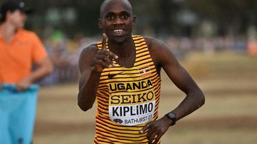 2023-02-18 07:42:53 Uganda's Jacob Kiplimo celebrates after crossing the finish line to win the men's senior race during the 2023 World Cross Country Championships at Mount Panorama in Bathurst on February 18, 2023.  
Saeed KHAN / AFP