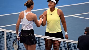 Karolina Pliskova of the Czech Republic (L) shakes hands with Naomi Osaka of Japan after their women's singles match at the Brisbane International tennis tournament in Brisbane on January 3, 2024. 
William WEST / AFP