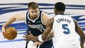 epa11376587 Dallas Mavericks guard Luka Doncic (L) dribbles past Minnesota Timberwolves forward Anthony Edwards (R) during the first half of the NBA Western Conference Finals playoff game four between the Minnesota Timberwolves and the Dallas Mavericks in Dallas, Texas, USA, 28 May 2024.  EPA/ADAM DAVIS SHUTTERSTOCK OUT