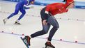 epa10982337 Davide Ghiotto of Italy (L) and Sander Eitrem of Norway in action during the men's 5000 m Division A race at the ISU Speed Skating World Cup in Beijing, China, 18 November, 2023.  EPA/ANDRES MARTINEZ CASARES