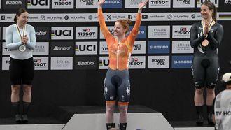 Netherlands' #122 Hetty Van de Wouw (C), Individual Neutral Athlete #57 Iana Burlakova (L) and New Zealand's #124 Ellesse Andrews celebrate during the women's 1km time trial event award ceremony at the 2025 UCI Track World Championships, in the Penalolen Velodrome in Santiago, on October 25, 2025. 
Rodrigo ARANGUA / AFP