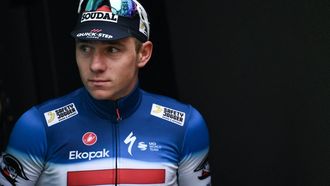 Soudal Quick-Step team's Belgian rider Remco Evenepoel looks on at the podium area after placing second in the 118th edition of the Giro di Lombardia (Tour of Lombardy), a 252km cycling race from Bergamo to Como on October 12, 2024. 
Marco BERTORELLO / AFP