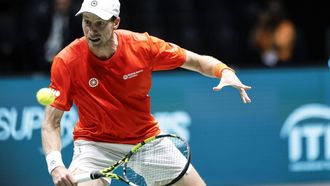 epa11596532 Botic Van de Zandschulp of the Netherlands in action against Raphael Collignon of Belgium during the Davis Cup finals group A match between the Netherlands and Belgium at Unipol Arena in Casalecchio, Bologna, Italy, 10 September 2024.  EPA/ELISABETTA BARACCHI