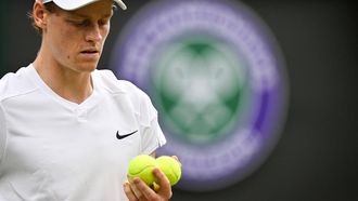 Italy's Jannik Sinner reacts as he plays against USA's Ben Shelton during their men's singles tennis match on the seventh day of the 2024 Wimbledon Championships at The All England Lawn Tennis and Croquet Club in Wimbledon, southwest London, on July 7, 2024. 
ANDREJ ISAKOVIC / AFP