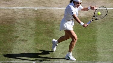 Czech Republic's Karolina Muchova returns against Japan's Naomi Osaka during their women's singles quarter-final tennis match on the ninth day of the 2026 Wimbledon Championships at The All England Lawn Tennis and Croquet Club in Wimbledon, southwest London, on July 7, 2026. 
Henry NICHOLLS / AFP