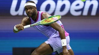 USA's Frances Tiafoe hits a return to Bulgaria's Grigor Dimitrov during their men's quarterfinals match on day nine of the US Open tennis tournament at the USTA Billie Jean King National Tennis Center in New York City, on September 3, 2024. 
CHARLY TRIBALLEAU / AFP