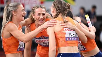 Netherlands' athlete Eveline Saalberg, Netherlands' athlete Lisanne de Witte, Netherlands' athlete Lieke Klaver and Netherlands' athlete Femke Bol celebrate finishing third in the women's 4x400m relay final during the World Athletics Championships in Tokyo on September 21, 2025. 
Kirill KUDRYAVTSEV / AFP