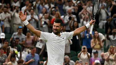 Serbia's Novak Djokovic celebrates winning against Canada's Felix Auger-Aliassime during their men's singles quarter-final tennis match on the ninth day of the 2026 Wimbledon Championships at The All England Lawn Tennis and Croquet Club in Wimbledon, southwest London, on July 7, 2026. 
Glyn KIRK / AFP