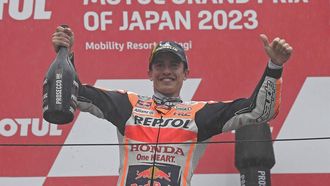 2023-10-01 10:09:14 Third placed Repsol Honda Team rider Marc Marquez of Spain celebrates on the podium of the MotoGP Japanese Grand Prix at the Mobility Resort Motegi in Motegi, Tochigi prefecture on October 1, 2023. 
Toshifumi KITAMURA / AFP