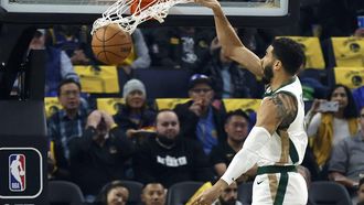epa11037943 Boston Celtics forward Jayson Tatum slam dunks the ball for two points against the Golden State Warriors during the first quarter of the NBA game between the Golden State Warriors and the Boston Celtics in San Francisco, California, USA, 19 December 2023.  EPA/JOHN G. MABANGLO SHUTTERSTOCK OUT