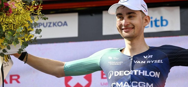 Team Decathlon CMA CGM's French rider Paul Seixas celebrates on the podium after winning the fifth stage of the Basque Country's Itzulia cycling tour, a 176.2 km race starting and finishing in Eibar, on April 10, 2026.  Seixas is the overall race leader.
ANDER GILLENEA / AFP