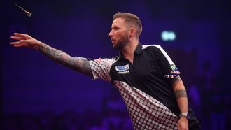 epa10733167 Danny Noppert of the Netherlands throws a dart during a match against Radek Szaganski of Poland (not seen) in the Poland Darts Masters 2023 tournament, in Warsaw, Poland, 07 July 2023  EPA/Piotr Nowak POLAND OUT