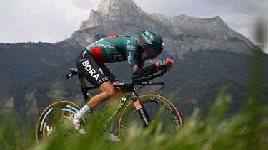 BORA - hansgrohe's German rider Emanuel Buchmann cycles during the 16th stage of the 110th edition of the Tour de France cycling race, 22 km individual time trial between Passy and Combloux, in the French Alps, on July 18, 2023. 
Marco BERTORELLO / AFP