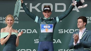 Team DSM-Firmenich PostNL team's Belgian rider Frank Van Den Broek celebrates on the podium with the best sprinter's green jersey after the 1st stage of the 111th edition of the Tour de France cycling race, 206 km between Florence and Rimini, in Italy, on June 29, 2024. 
Thomas SAMSON / AFP