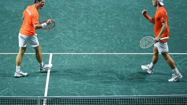 Netherlands' Tallon Griekspoor (R) and Wesley Koolhof react to winning a point against Italy's Jannik Sinner and Lorenzo Sonego during the second men's doubles quarter-final tennis match between Italy and Netherlands of the Davis Cup tennis tournament at the Martin Carpena sportshall, in Malaga on November 23, 2023. 
JORGE GUERRERO / AFP