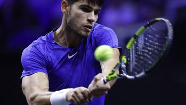 Spain's Carlos Alcaraz of Team Europe returns the ball to USA's Taylor Fritz of Team World during their 2024 Laver Cup men's singles tennis match in Berlin, Germany on September 22, 2024. 
Odd ANDERSEN / AFP