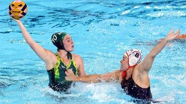 epa11511976 Alice Williams of Australia (L) and Vivian Sevenich of Netherlands in action during the Women's Preliminary Round Group A match between the Netherlands and Australia of the Water Polo competitions in the Paris 2024 Olympic Games, at the Aquatics Centre in Saint Denis, France, 31 July 2024.  EPA/ANNA SZILAGYI