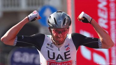 UAE Team Emirates's US rider Brandon McNulty celebrates as he crosses the finish line to win the fifteenth stage of the Giro d'Italia 2023 cycling race, 195 km between Seregno and Bergamo, on May 21, 2023. 
Luca Bettini / AFP