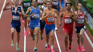 2023-08-19 19:28:51 Netherlands' Niels Laros, Spain's Mohamed Katir, USA's Cole Hocker, Italy's Pietro Arese, Norway's Narve Gilje Nordas and other athletes cross the finish line in the men's 1500m heats during the World Athletics Championships at the National Athletics Centre in Budapest on August 19, 2023. 
Attila KISBENEDEK / AFP