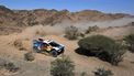 Nasser Racing's Qatari driver Nasser Al-Attiyah and French co-driver Mathieu Baumel steer their car during stage 7 between Riyad and Al Duwadimi on January 14, 2024, as part of the Dakar rally 2024. 
PATRICK HERTZOG / AFP