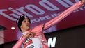 UAE Team Emirates XRG's Mexican rider Isaac Del Toro puts on the pink jersey of overall leader (Maglia Rosa) as he celebrates on the podium after placed second in the 19th stage of the 108th Giro d'Italia cycling race of 166kms from Biella to Champoluc on May 30, 2025. 
Luca Bettini / AFP