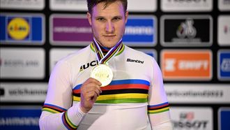2023-08-08 21:35:00 Netherlands' Jeffrey Hoogland (C) celebrates winning gold in the men's 1km Time Trial Final race at the UCI Cycling World Championships in Glasgow, Scotland on August 8, 2023. Australia's Matthew Glaetzer won silver and Australia's Thomas Cornish won bronze. 
Oli SCARFF / AFP