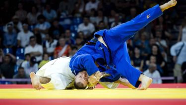 PARIJS - Judoka Michael Korrel wordt uitgeschakeld door Peter Paltchik van Israel tijdens de herkansing op de Olympische Spelen. ANP REMKO DE WAAL