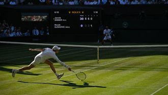 Italy's Jannik Sinner misses his return to Serbia's Novak Djokovic during their men's singles semi-final tennis match on the twelfth day of the 2025 Wimbledon Championships at The All England Lawn Tennis and Croquet Club in Wimbledon, southwest London, on July 11, 2025. 
Glyn KIRK / AFP