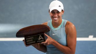 epa11817950 Madison Keys of USA poses with the trophy after winning the Adelaide International tennis tournament women's final against Jessica Pegula of USA in Adelaide, Australia, 11 January 2025.  EPA/MATT TURNER AUSTRALIA AND NEW ZEALAND OUT