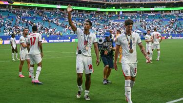 England's midfielder #10 Jude Bellingham greets with his medal after winning the 2026 World Cup football tournament third-place match between France and England at the Miami Stadium in Miami on July 18, 2026. 

CHANDAN KHANNA / AFP