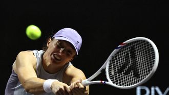 Poland's Iga Swiatek returns the ball to US' Amanda Anisimova during their WTA Finals tennis tournament in Riyadh on November 5, 2025. 
Fayez NURELDINE / AFP