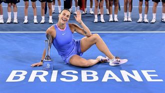Belarus' Aryna Sabalenka celebrates with the trophy after defeating Russia's Polina Kudermetova in their women's singles final match at the Brisbane International tennis tournament on Pat Rafter Arena in Brisbane on January 5, 2025. 
William WEST / AFP