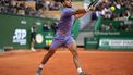 Spain's Carlos Alcaraz plays a forehand return to Italy's Lorenzo Musetti during the Monte Carlo ATP Masters Series Tournament final tennis match at the Monte Carlo Country Club in Roquebrune-Cap-Martin on April 13, 2025. 
Valery HACHE / AFP