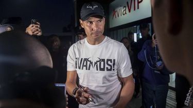 epa11721281 Spanish tennis player Rafael Nadal signs autographs upon arrival at the Malaga airport, Spain, 14 November 2024. Nadal will play for Spain at the upcoming Davis Cup Finals in Malaga.  EPA/Daniel Perez