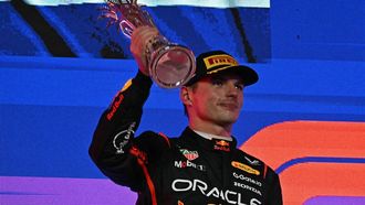 Second-placed Red Bull Racing's Dutch driver Max Verstappen lifts his trophy during podium celebrations following the 2025 Saudi Arabia Formula One Grand Prix at the Jeddah Corniche Circuit on April 20, 2025. 
Gabriel BOUYS / AFP