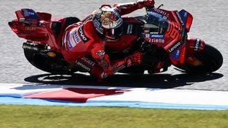 Ducati Lenovo Team rider Marc Marquez of Spain rides his motorcycle during the MotoGP class practice session of the Japanese MotoGP Grand Prix at Mobility Resort Motegi in Motegi, Tochigi prefecture on September 27, 2025.  
Toshifumi KITAMURA / AFP