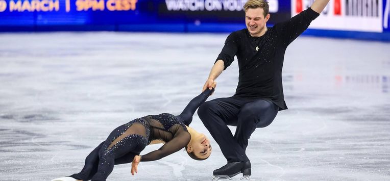 epa12849474 Daria Danilova and Michel Tsiba of Netherlands perform in the Pairs Short Program during the ISU Figure Skating World Championships 2026 in Prague, Czech Republic, 25 March 2026.  EPA/MARTIN DIVISEK