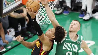 epa11135494 Boston Celtics center Kristaps Porzingis (R) blocks the shot of Atlanta Hawks forward Jalen Johnson (L) during the second half of the NBA basketball game between the Boston Celtics and the Atlanta Hawks in Boston, Massachusetts, USA, 07 February 2024.  EPA/CJ GUNTHER SHUTTERSTOCK OUT