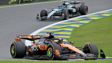 McLaren's Australian driver Oscar Piastri (Bottom) races during the sprint of the Sao Paulo Formula One Grand Prix at the Jose Carlos Pace racetrack, aka Interlagos, in Sao Paulo, Brazil on November 8, 2025. 
Nelson ALMEIDA / AFP