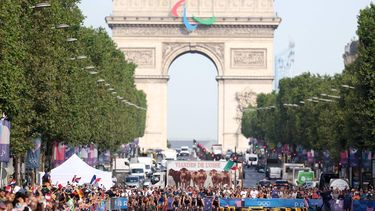 epa11510777 Athletes compete in the bike section of the Women Individual race of the Triathlon competitions in the Paris 2024 Olympic Games, at the Pont Alexandre III in Paris, France, 31 July 2024.  EPA/MOHAMMED BADRA