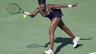 epa11205538 Venus Williams of the US in action against Nao Hibino of Japan during the BNP Paribas Open tennis tournament in Indian Wells, California, USA, 07 March 2024.  EPA/JOHN G. MABANGLO