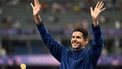 Bronze medallist US' Grant Fisher celebrates on the podium after competing in the men's 5000m final of the athletics event during the Paris 2024 Olympic Games at Stade de France in Saint-Denis, north of Paris, on August 10, 2024. 
MARTIN BERNETTI / AFP