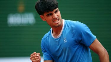 Spain's Carlos Alcaraz celebrates after winning a game against Argentina's Sebastian Baez during the Monte Carlo ATP Masters Series Tournament round of 64 tennis match on Court Rainier III at the Monte-Carlo Country Club in Roquebrune-Cap-Martin, south-eastern France on April 7, 2026. 
Valery HACHE / AFP