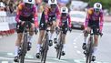 Netherland's SD Worx-Protime team riders cross the finish line of the stage 1 of the Vuelta a Espana women's race, a 16 km race against the clock between Valencia and Valencia, on April 28, 2024. 
JOSE JORDAN / AFP